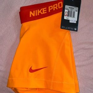 orange/red nike pros
